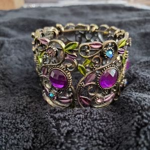 Brass-like multi coloured bracelet